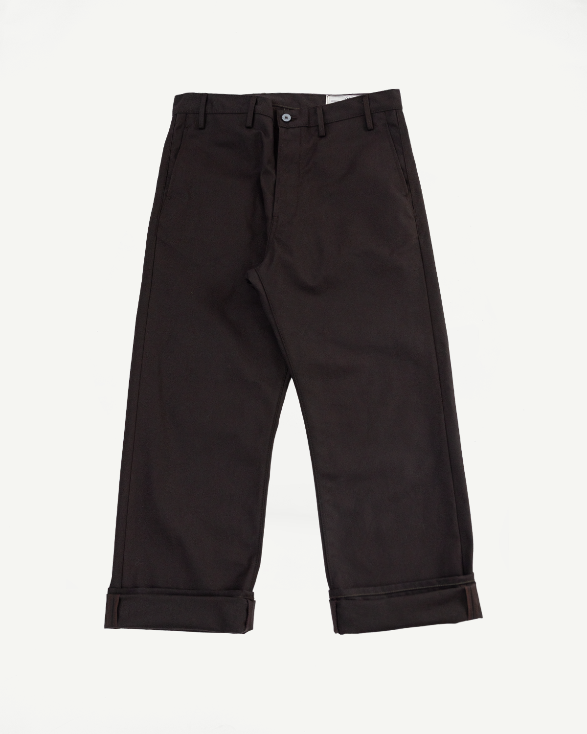 Front view flat lay of dark brown trousers with cuffed hems.