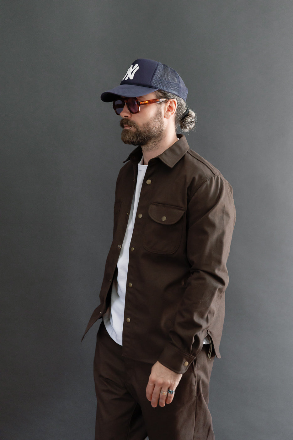Side view of athletic male model (5'9
