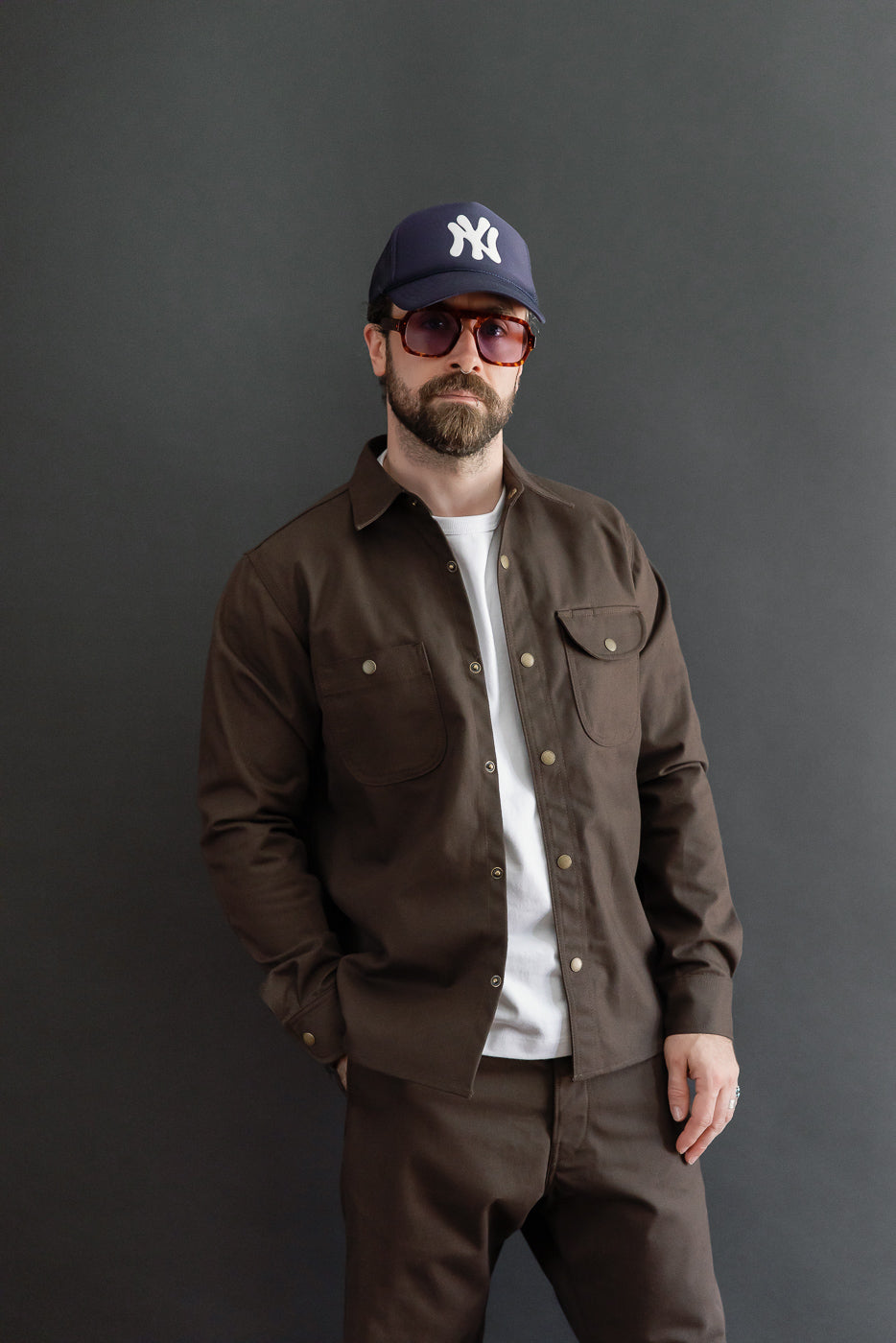 Full body front view of a male model, 5'9