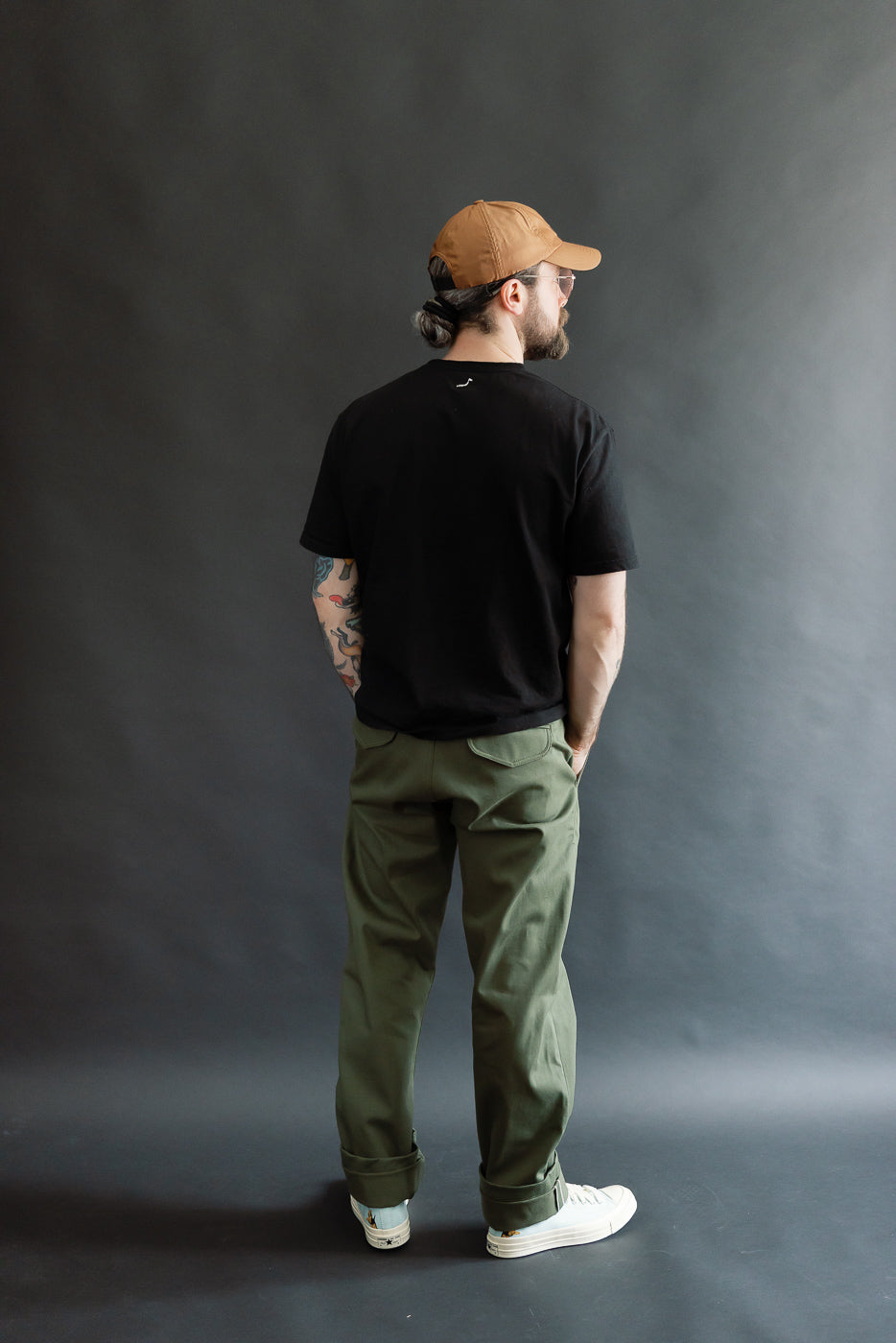 Full body rear view of male model 5'9