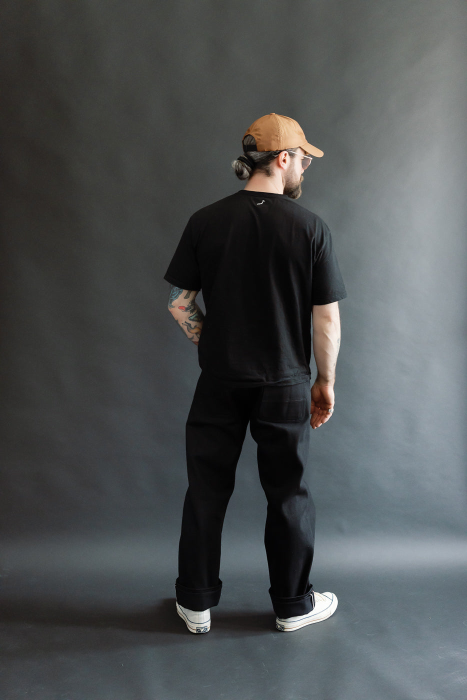 Full body back view of male model, 5'9