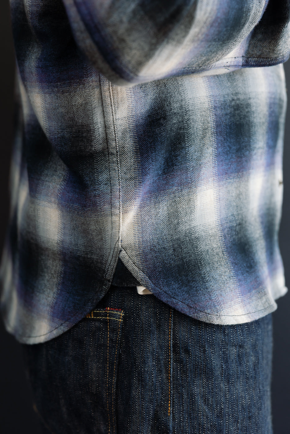 Close-up side view of a male model (5'9