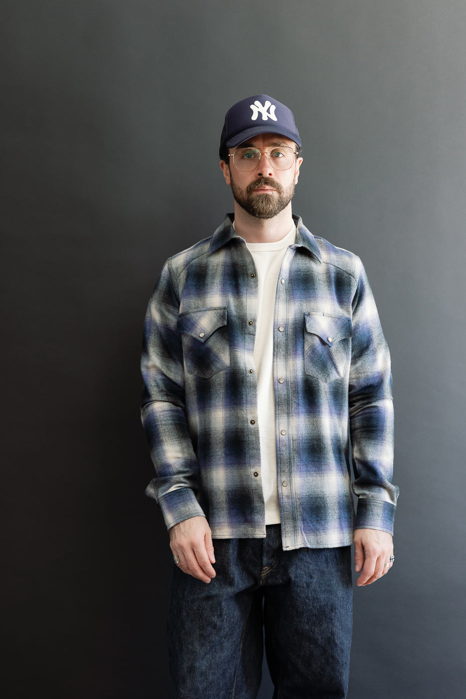 Full body front view of a male model, 5'9