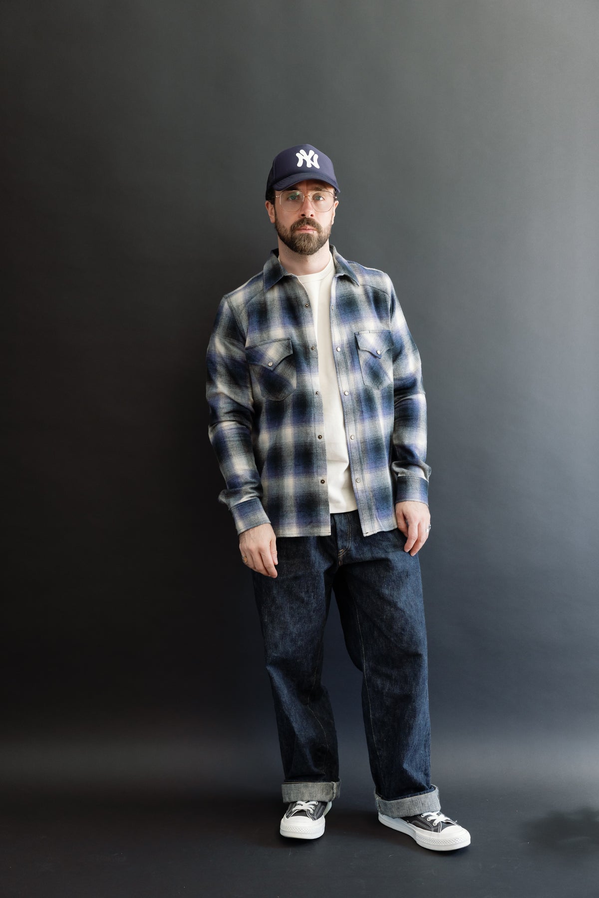 Full body front view of a male model, 5'9