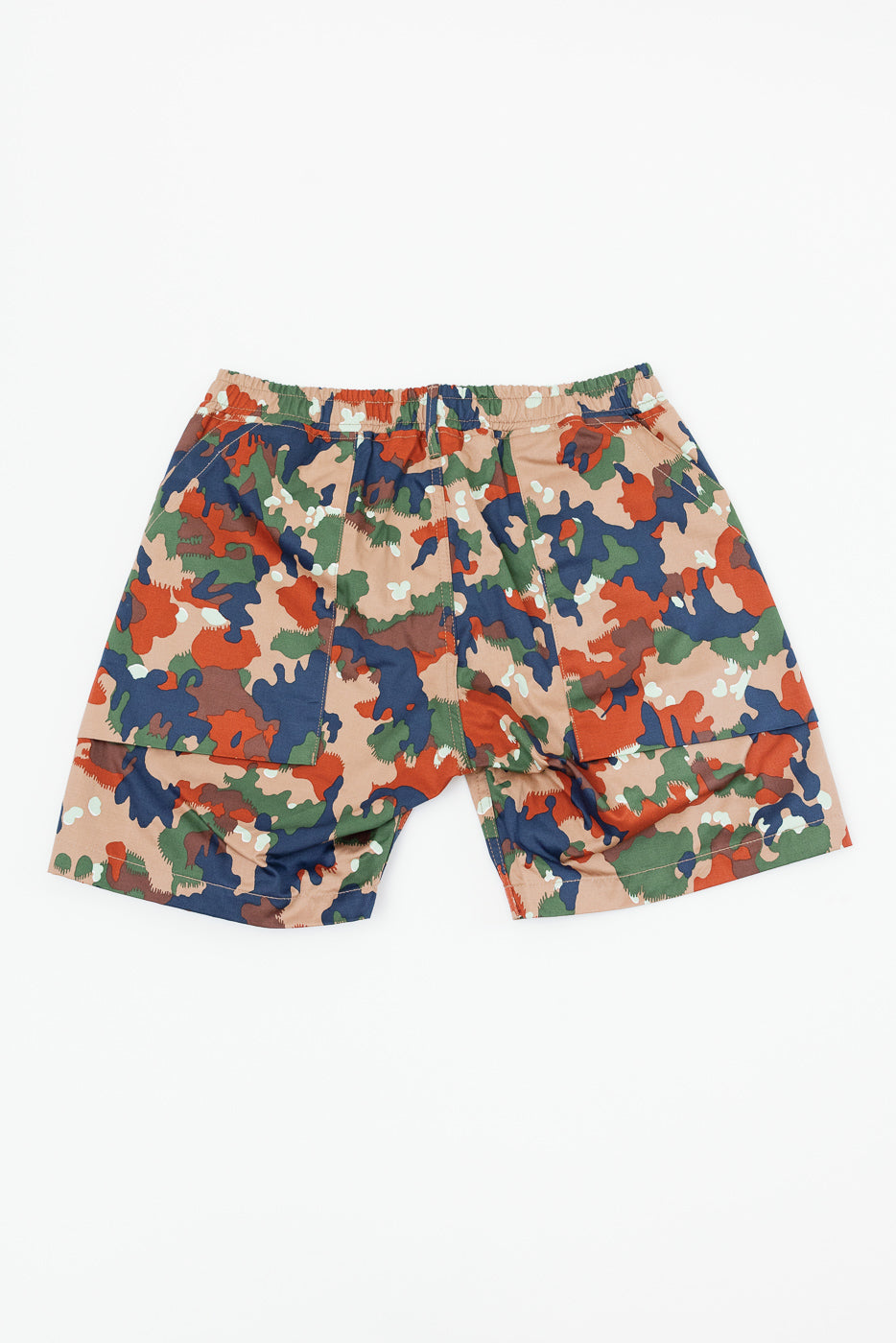 Back view of camouflage shorts with elastic waistband and side pockets, flat lay