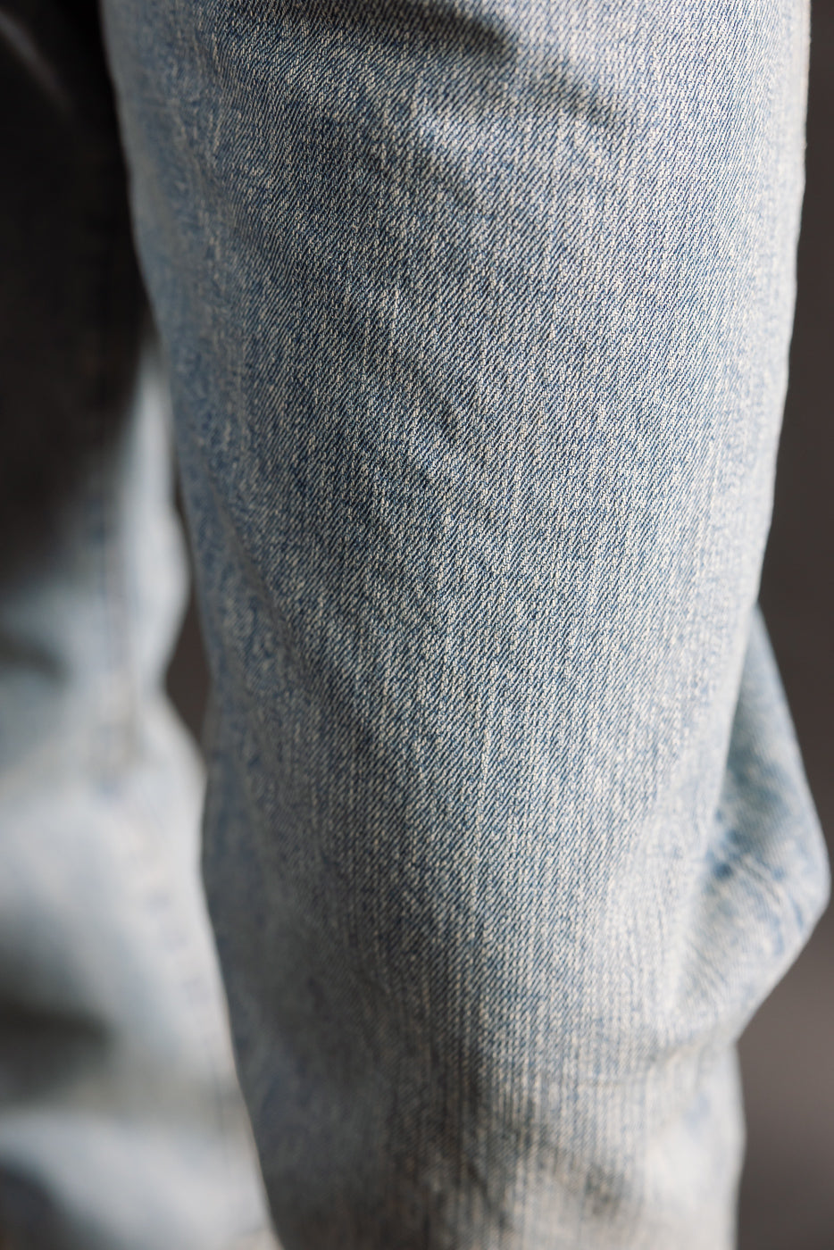 Close-up of Rogue Territory 15oz river washed selvedge denim fabric, front thigh texture detail