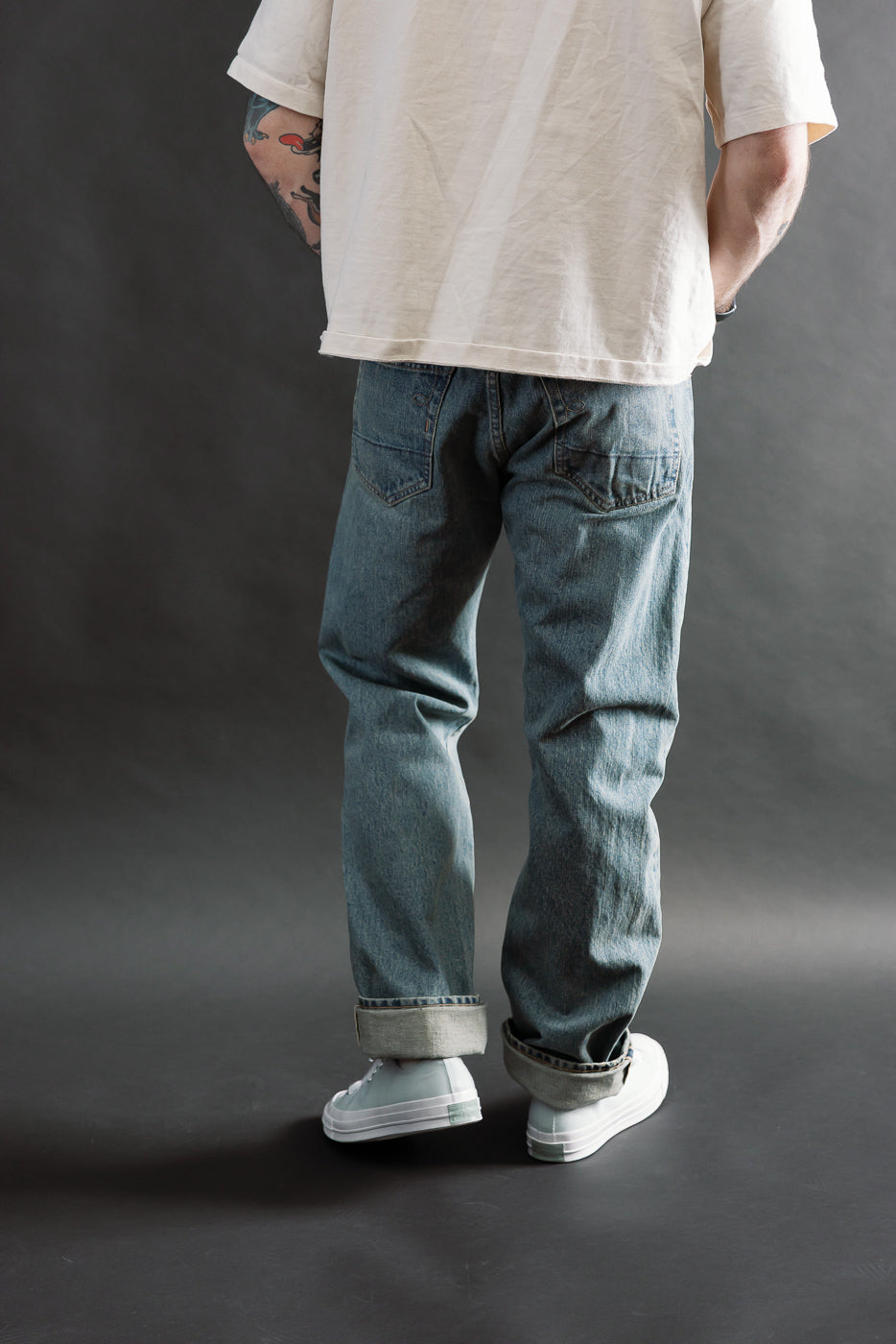 Back view of Rogue Territory 15oz River Washed Selvedge Stanton Jeans on male model, 5'9