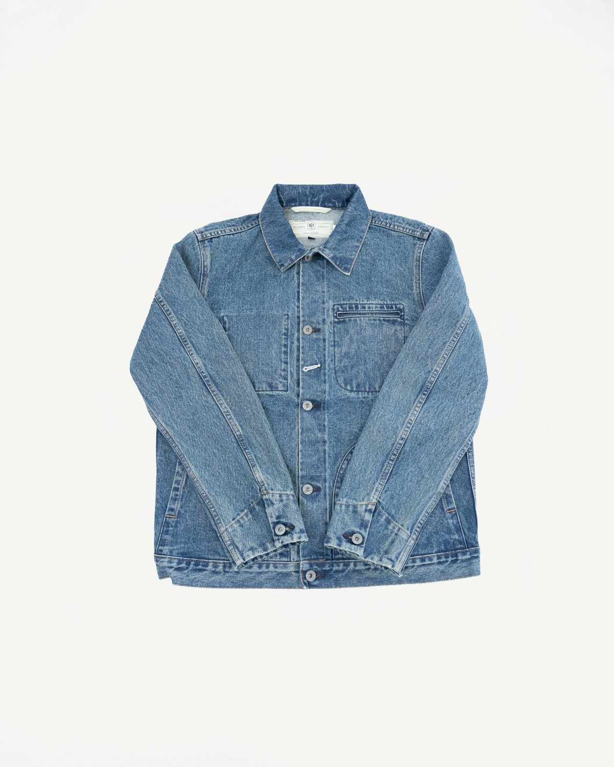 Front view of men's denim jacket, button-up, chest pocket, collar, and sleeve details on flat lay