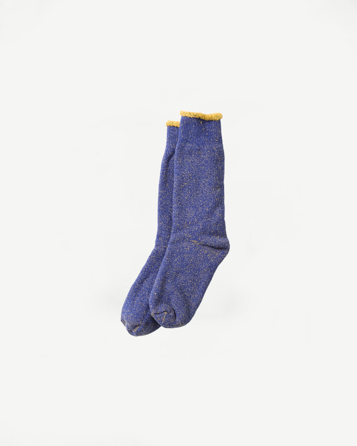Flat lay front view of Rototo R1612 reversible pile socks in blue with light yellow cuffs, Dant.