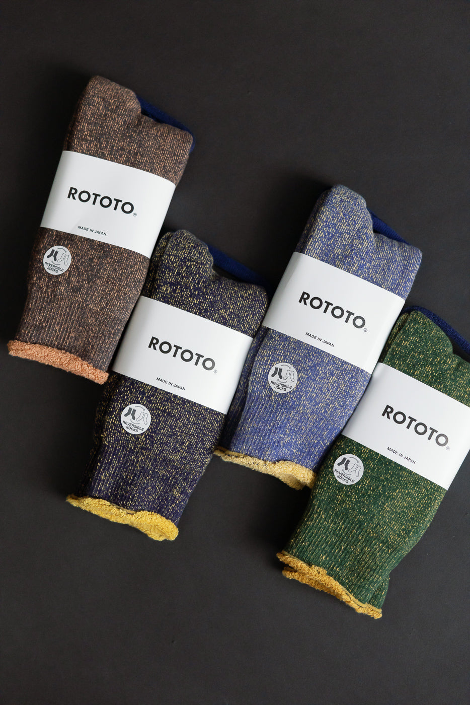 R1612 - Reversible Pile Socks - Navy, Yellow: Four pairs of ROTOTO socks in flecked yarns, featuring reversible terry linings, highlighting a dense, soft, two-tone knit inspired by 1970s reversible T-shirts.
