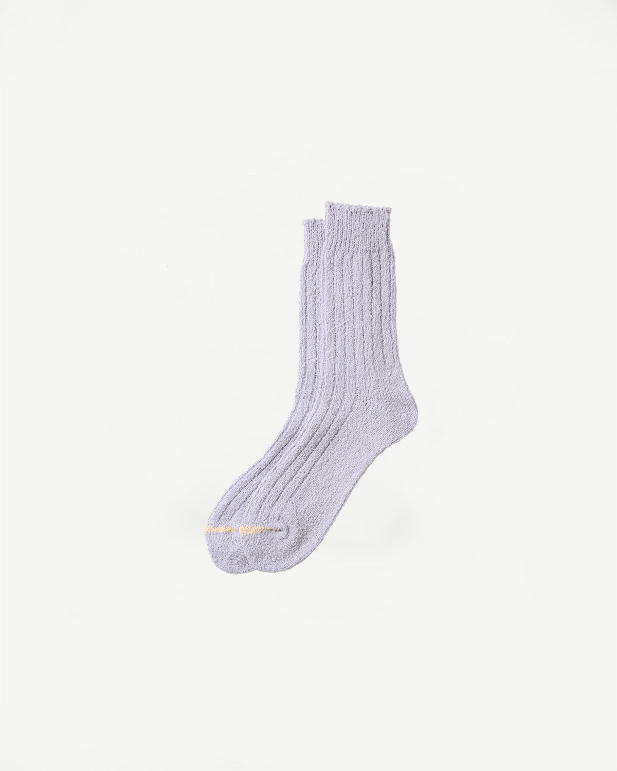Flat lay front view of Rototo recycled cotton bouclé crew socks in pale blue, ribbed texture, Dant