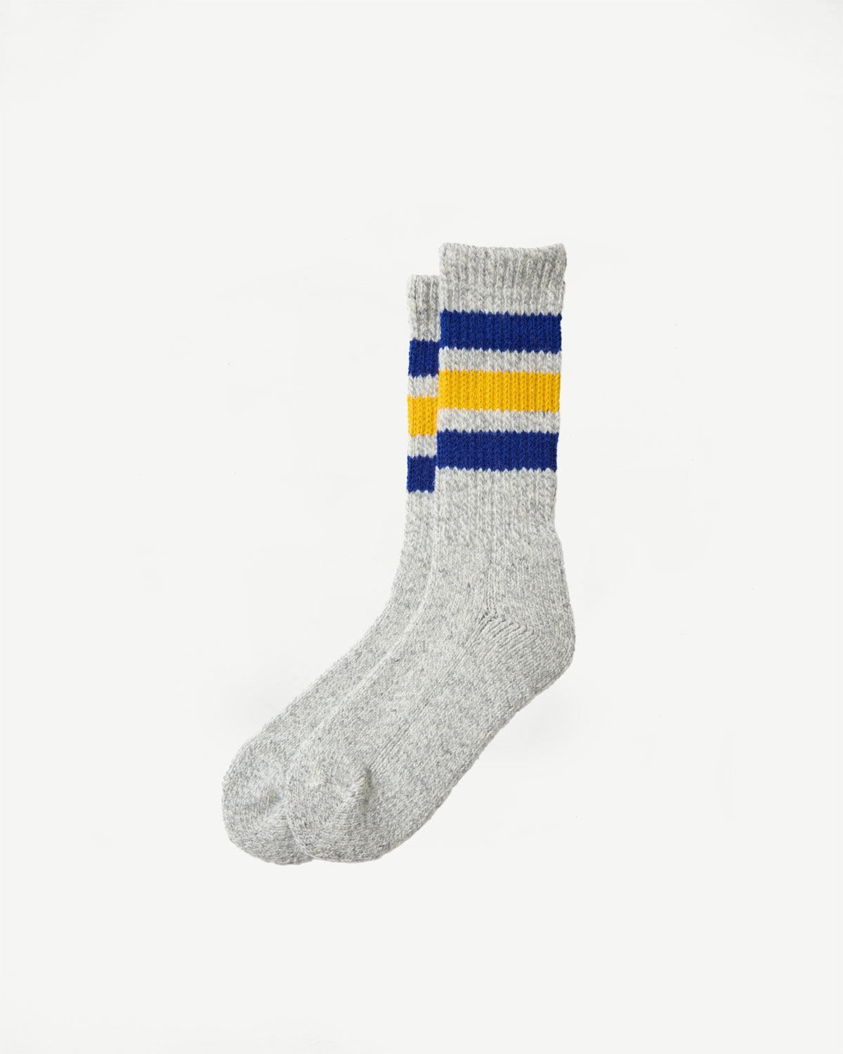 Flat lay, side view of grey marl crew socks with blue and yellow stripes.