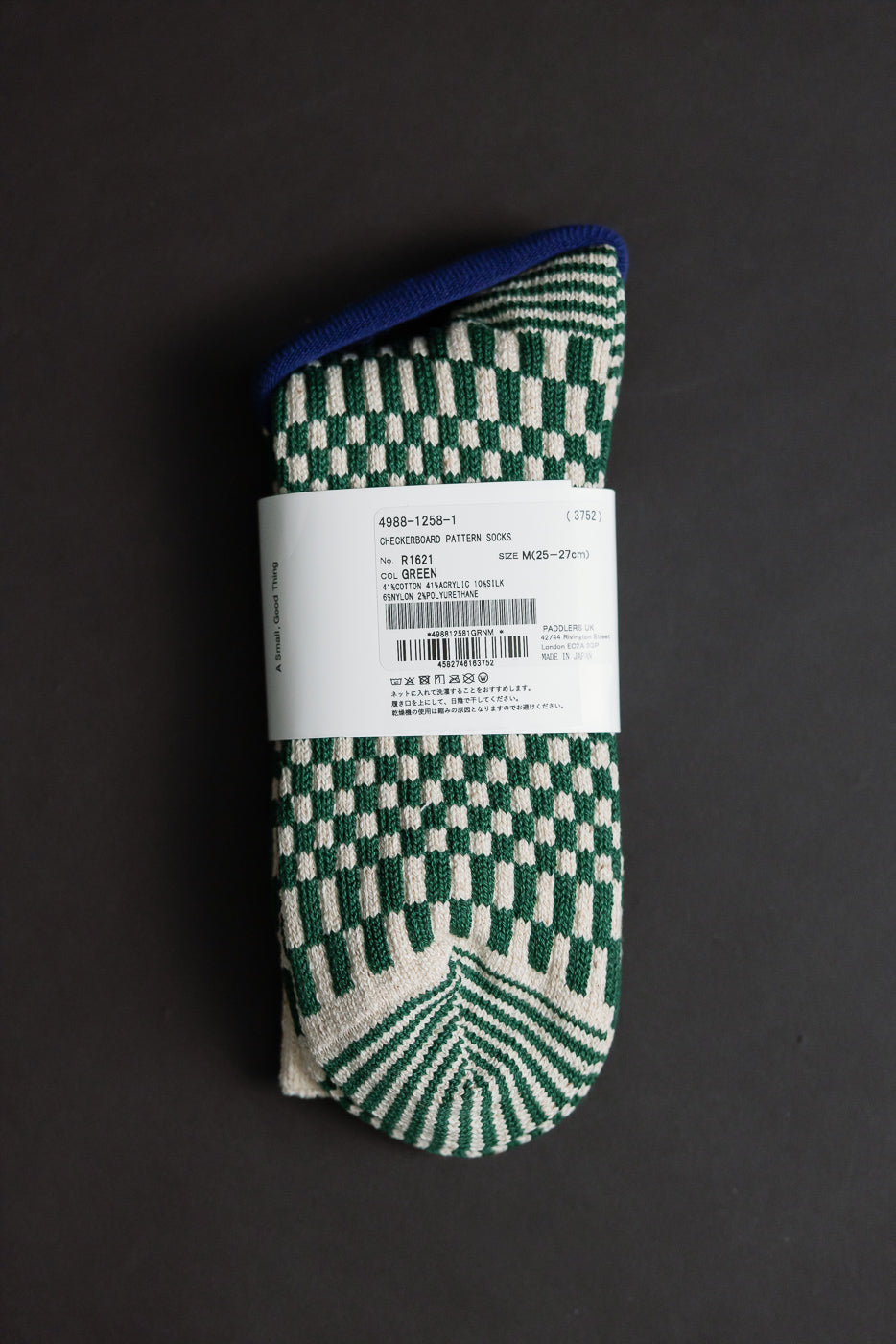 R1621 - Checkerboard Pattern Crew Socks - Green, mid-length with a green-and-white checkerboard design and striped toe. Wrapped in a labeled band, highlighting premium jacquard knit construction for smooth fit and subtle luster.
