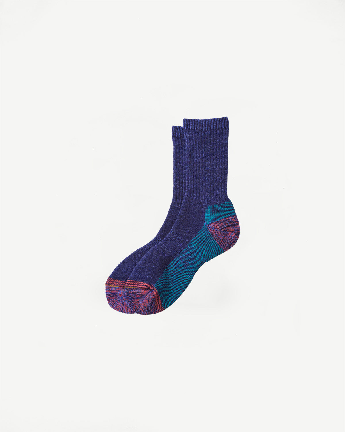 Flat lay of Rototo R1632 double face merino pile socks, dark blue, front view showing textured knit and multicolor heel and toe accents.