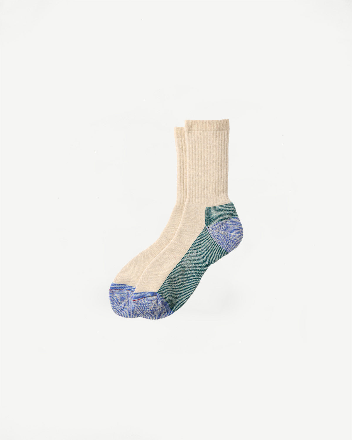 Flat lay front view of natural Rototo R1632 double face merino pile socks with contrast heel and toe
