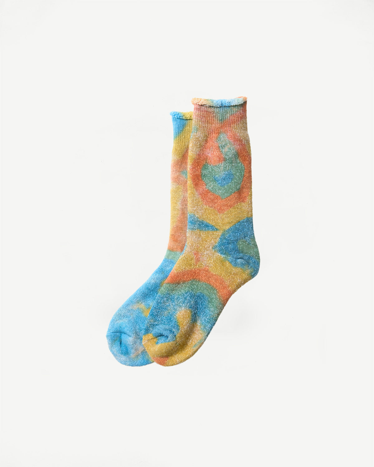 Front flat lay close-up of crew socks with orange, light blue, and yellow tie-dye pattern.