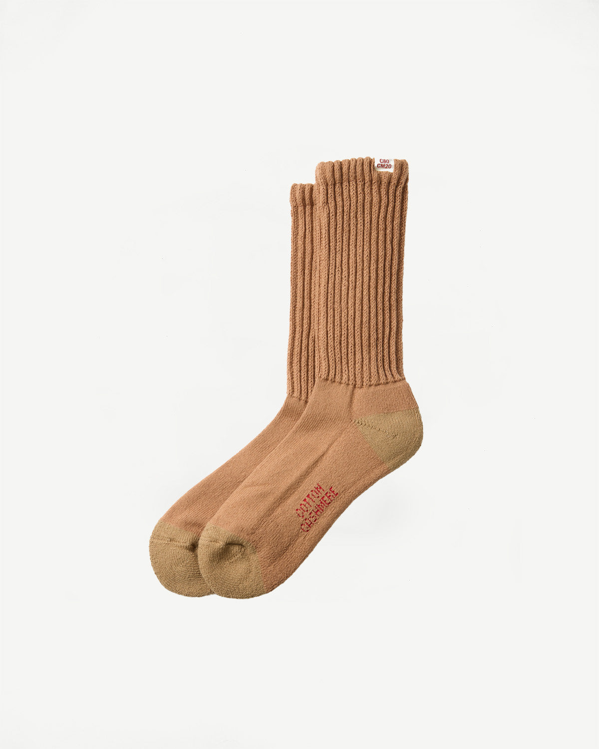 Side view of tan ribbed cotton cashmere socks on a white background.