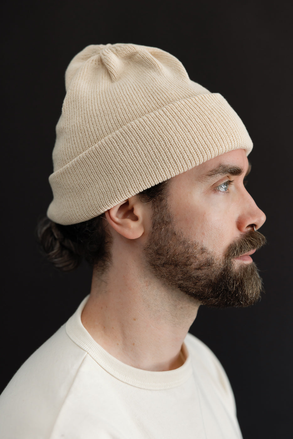 Close-up side view of a male model, 5'9