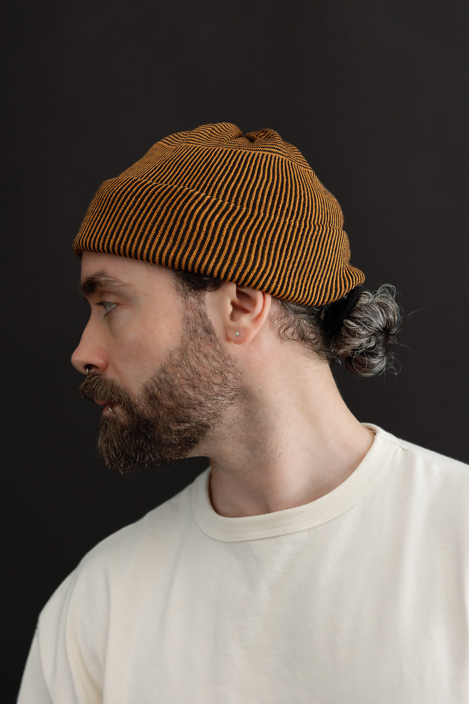 Profile close-up of male model, 5'9