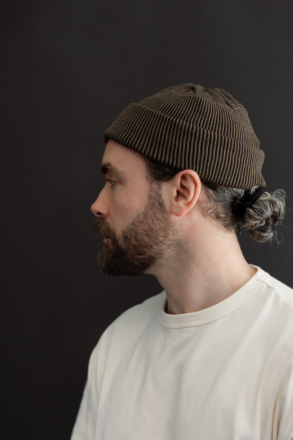 Close-up profile of a male model, 5'9