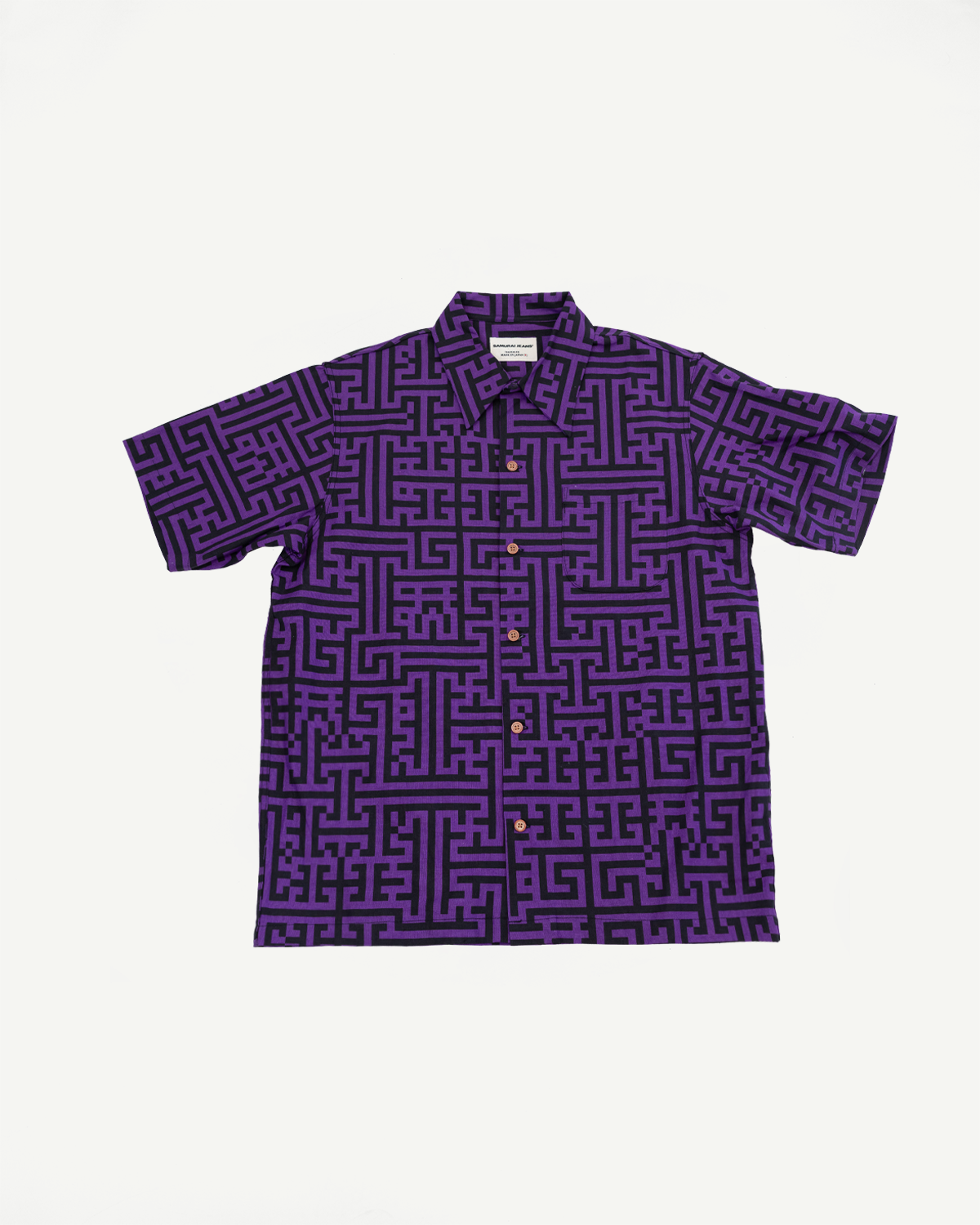 Purple short-sleeve shirt with black geometric maze print, front view, button-down, collar, tag visible