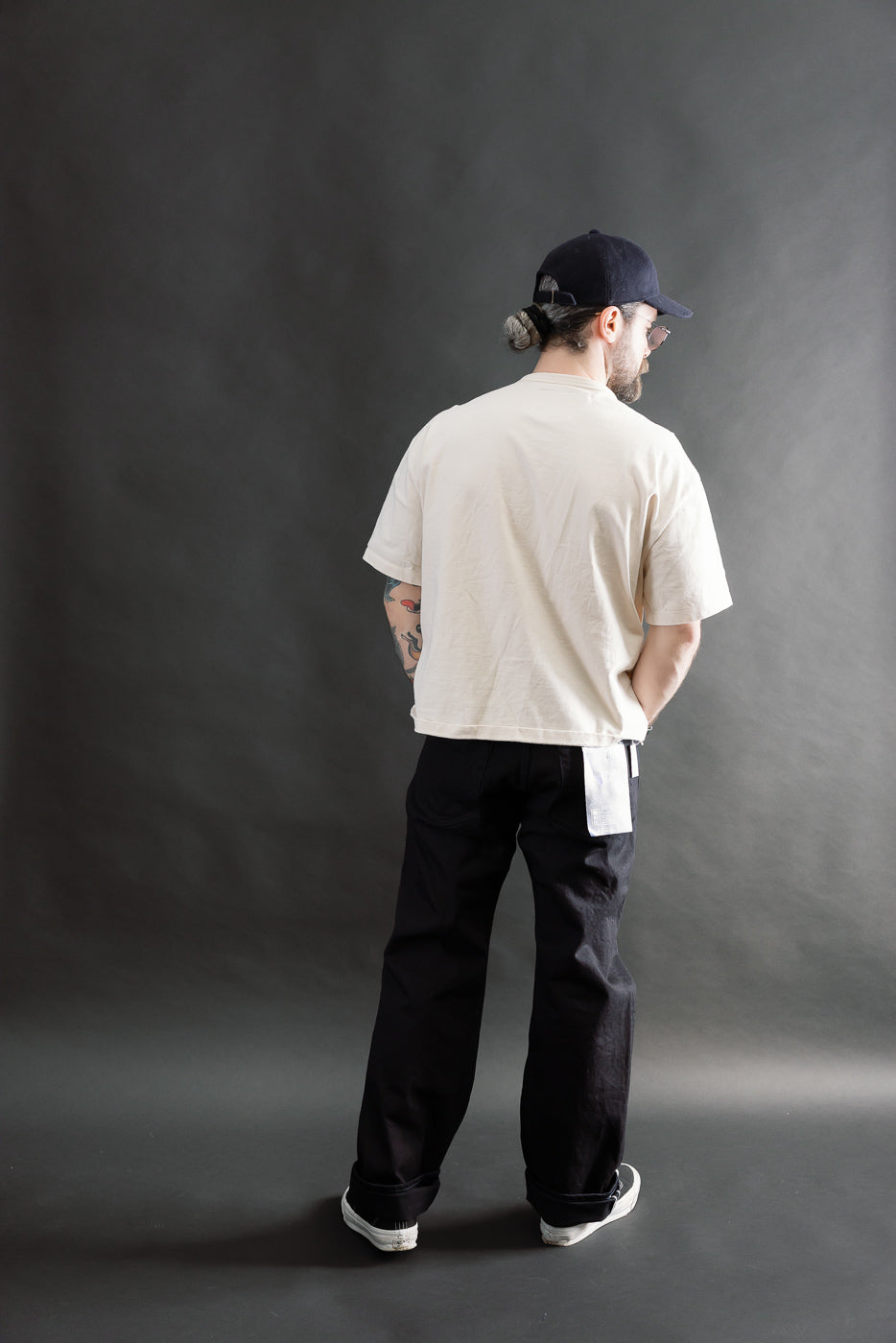 Full body back view of male model 5'9