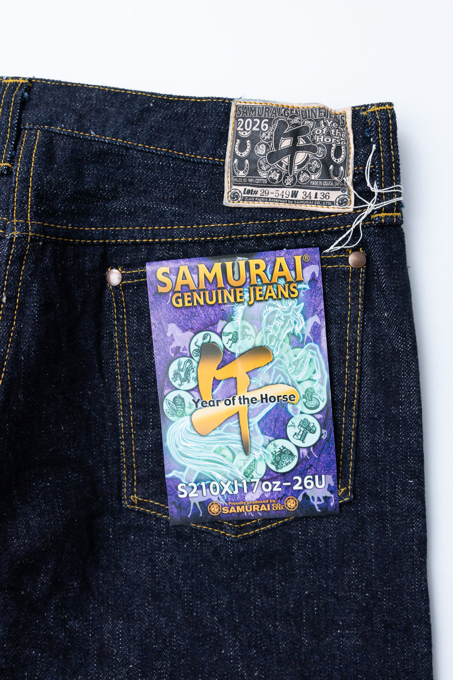 Close-up of Samurai Genuine Jeans back pocket, Year of the Horse tag, 17oz selvedge denim