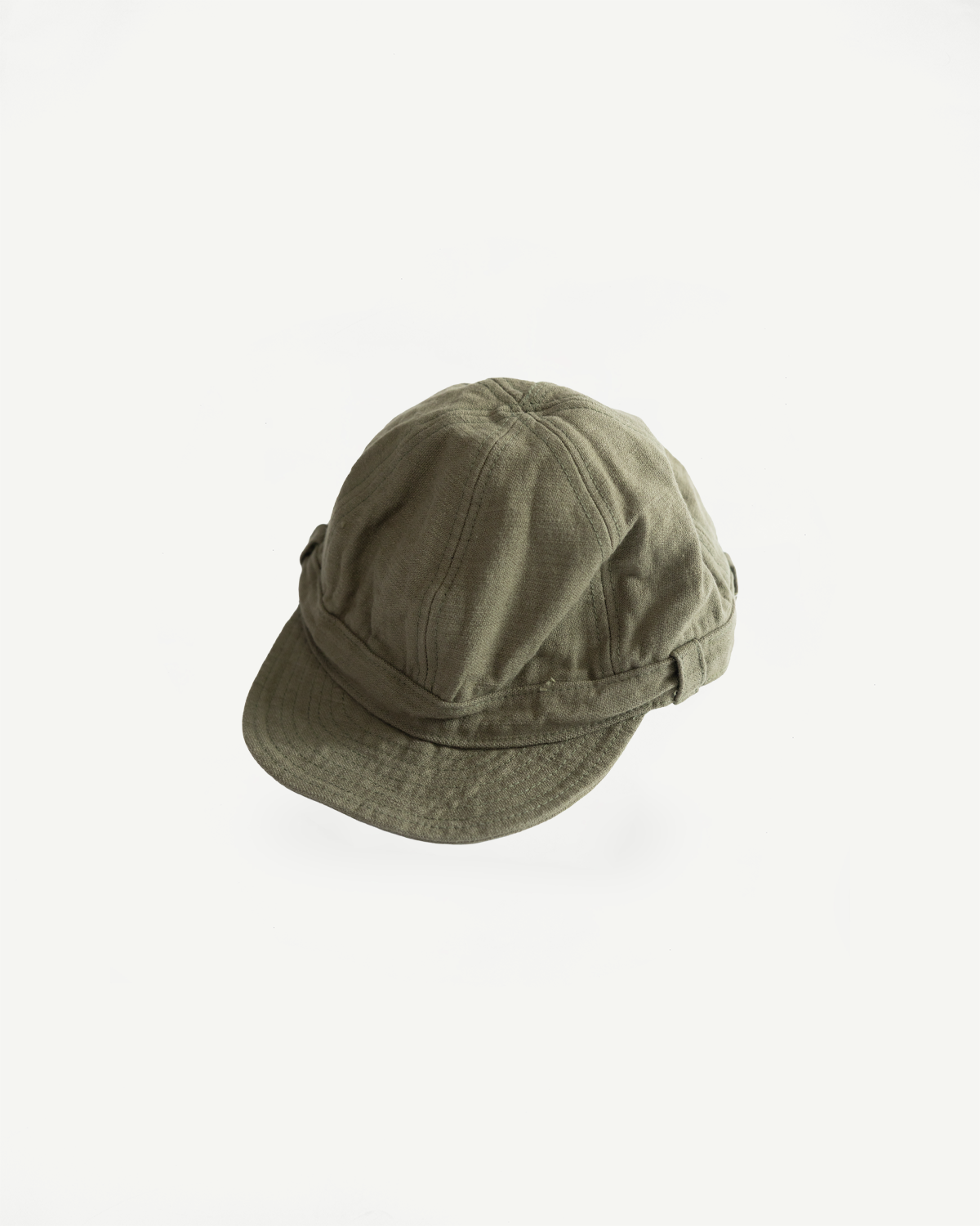 Flat lay front view of olive heavy back satin workman cap, showing brim and top stitching detail.