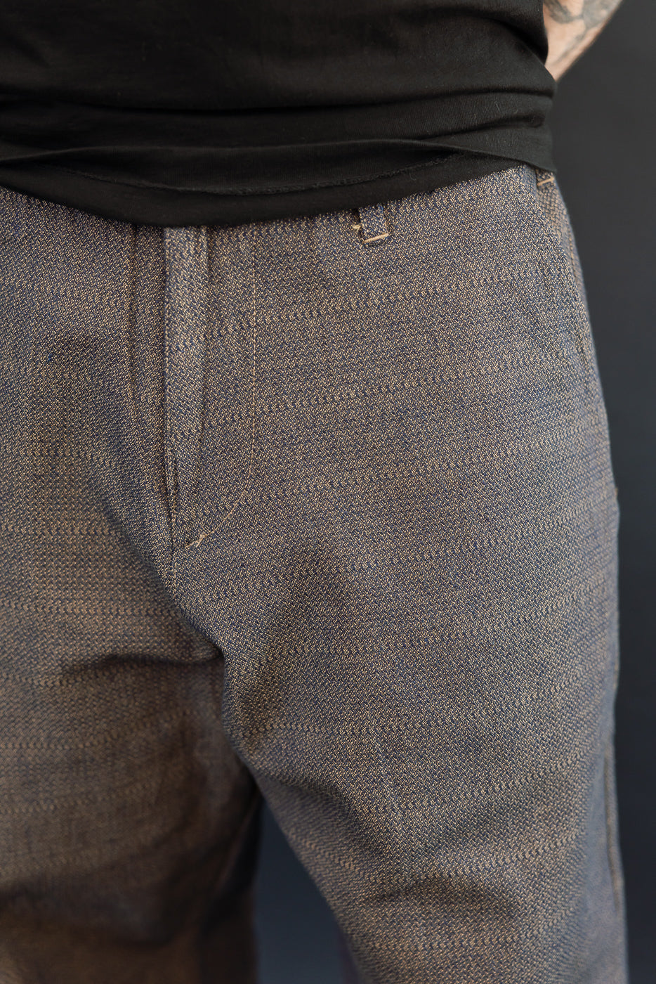 Close-up front view of selvedge pants, male model 5'9