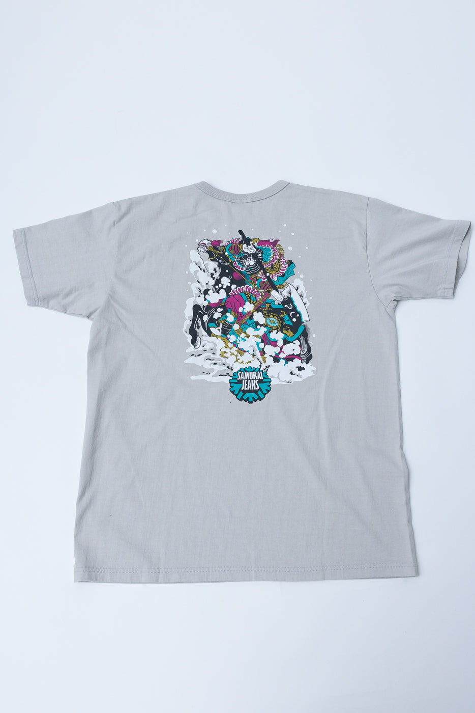 Gray graphic tee back view, Samurai Jeans logo, colorful samurai print, flat lay
