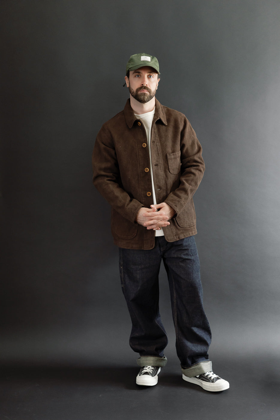 Full body front view of a male model, 5'9
