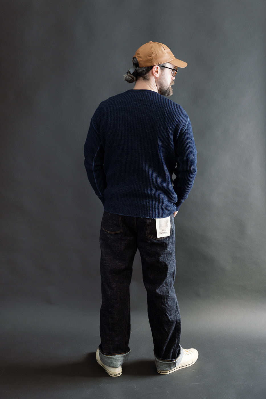 Full body back view of male model 5'9