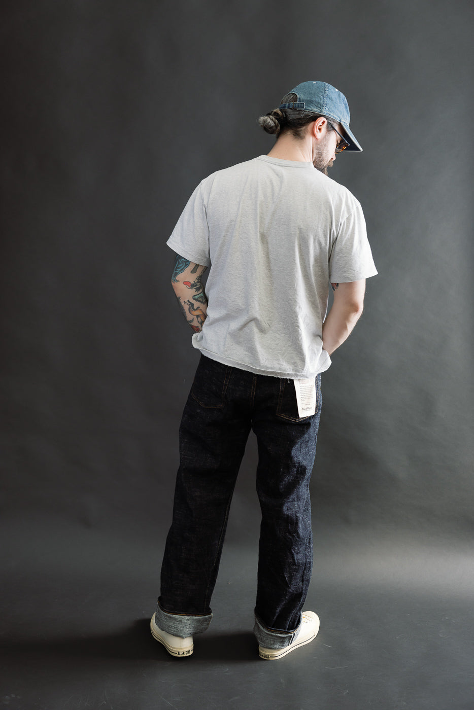 Full body rear view of male model 5'9
