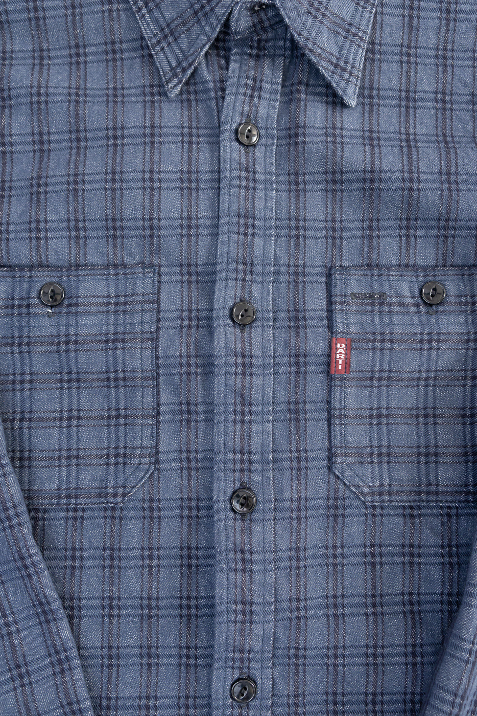 Close-up of Studio D'Artisan navy jacquard check work shirt front chest, showing buttons, flap pockets, and fabric texture.