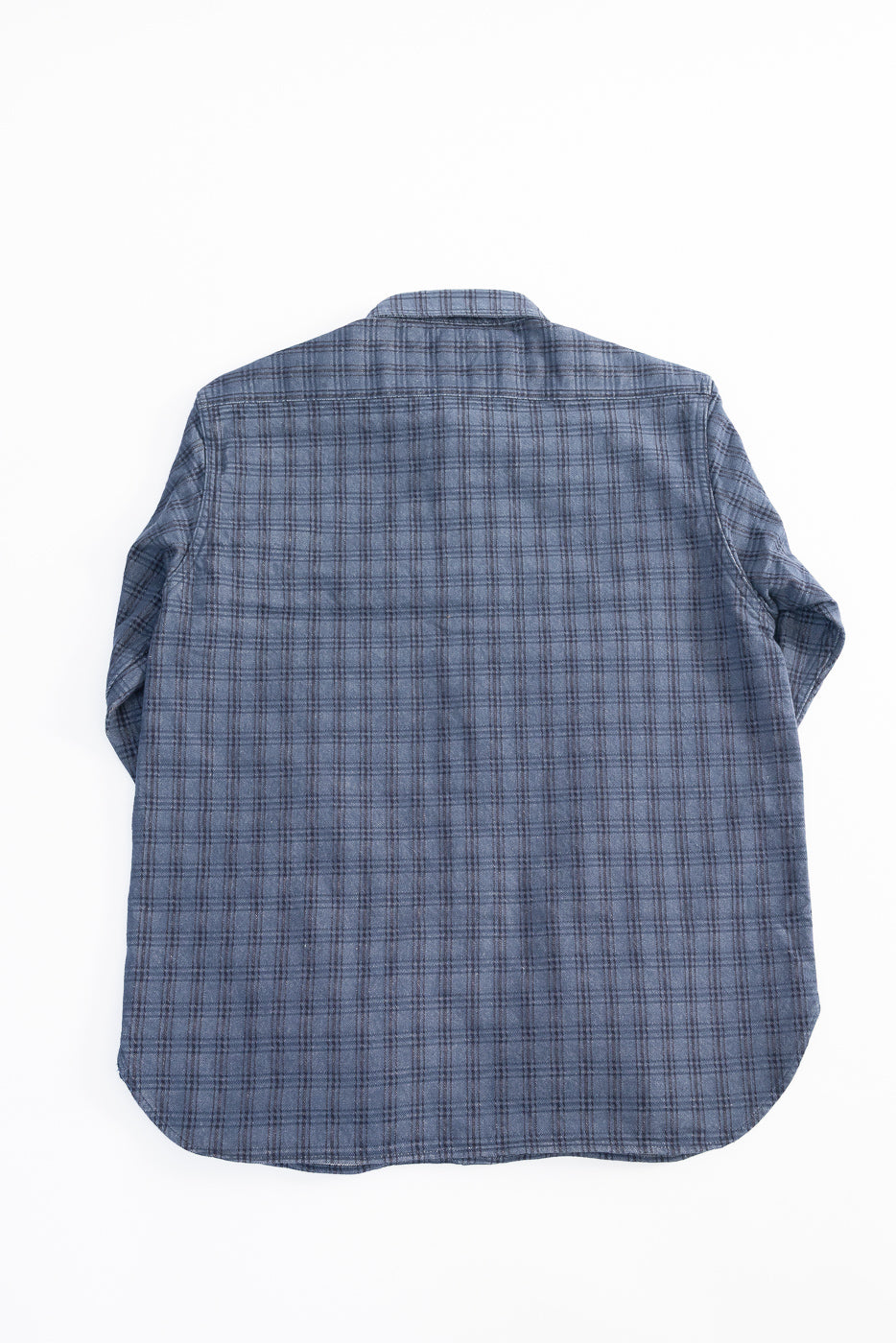 Flat lay back view of navy jacquard check work shirt, curved hem, textured cotton fabric