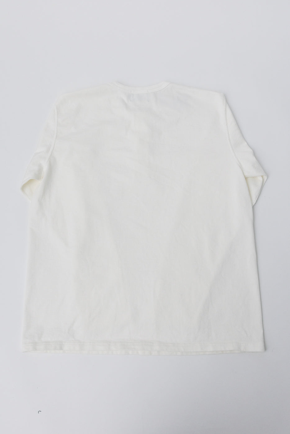 Flat lay of Studio D'Artisan white Suvin Gold LS Henley, back view, crewneck, short sleeves
