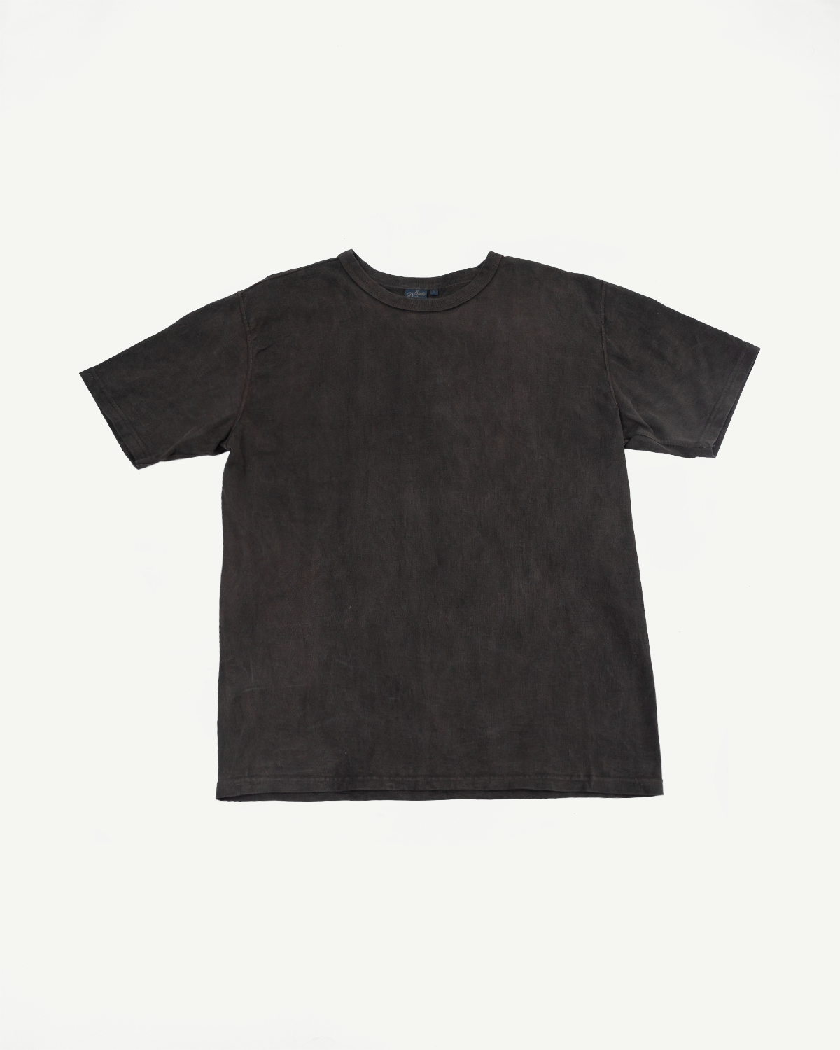 Front flat lay of dark textured short-sleeve t-shirt with crew neck and tag detail