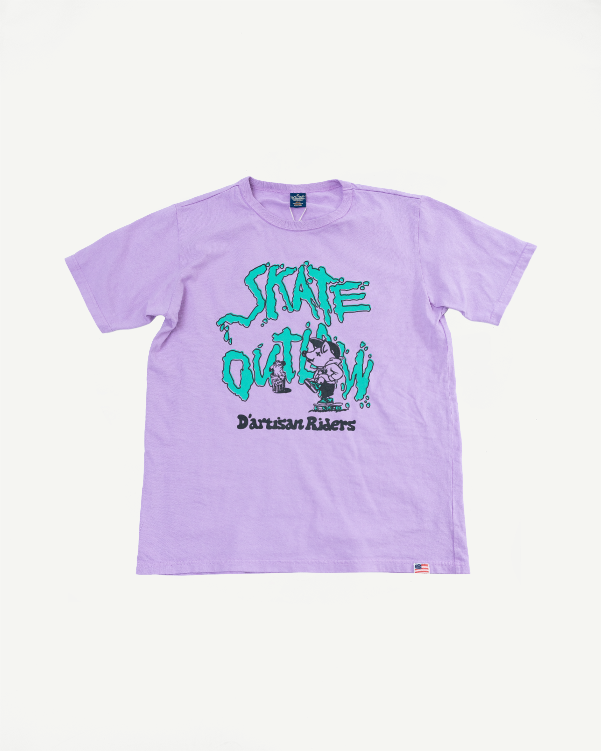 Lavender graphic tee front view, 'Skate Outlaw' print, ribbed crew neck, USA flag tag, casual apparel