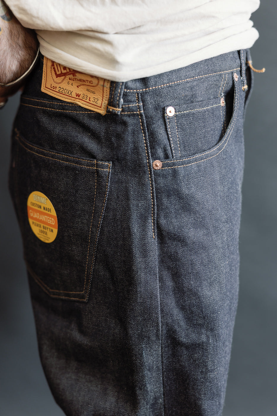 Close-up side view of male model, 5'9