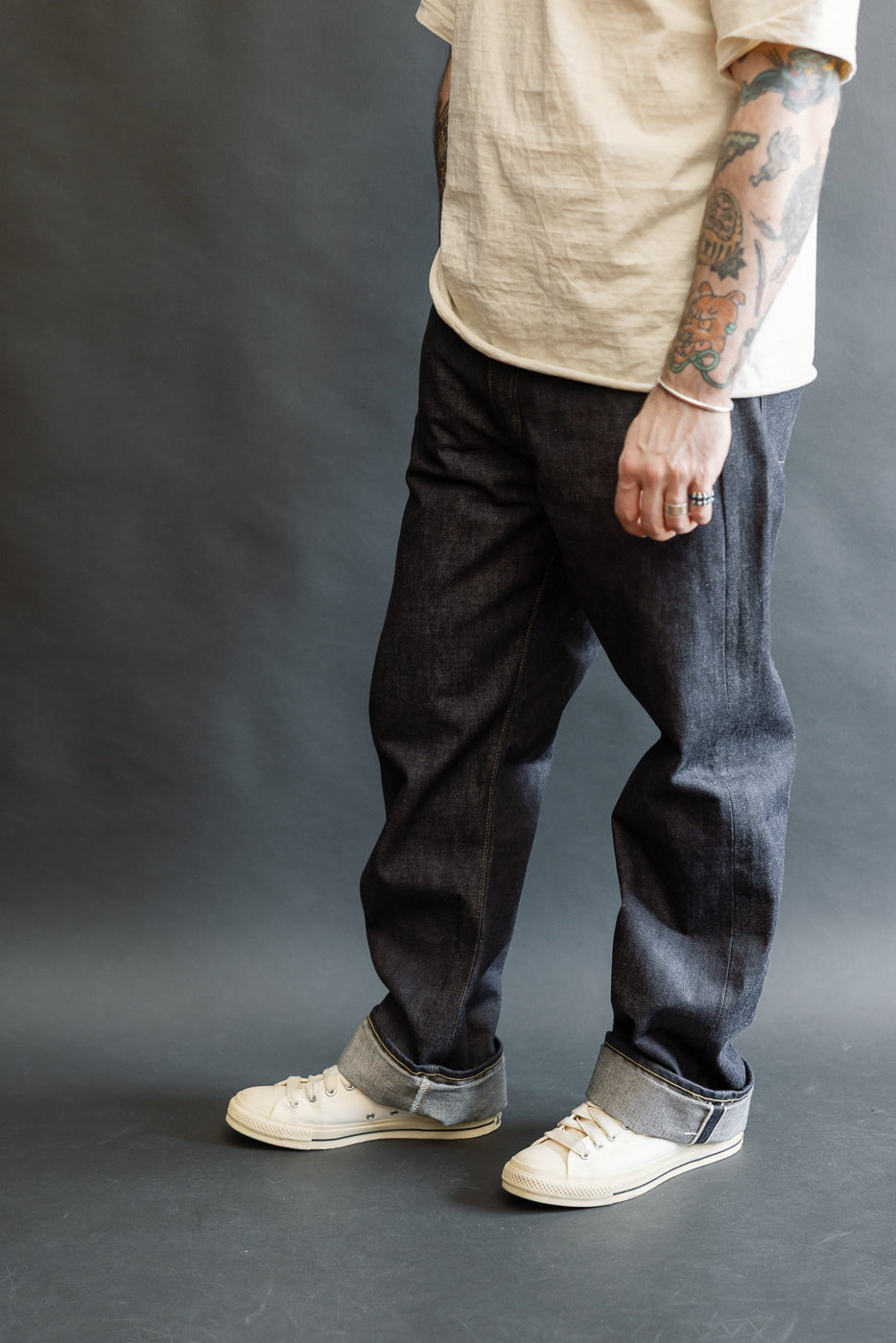 Full body side view of male model 5'9