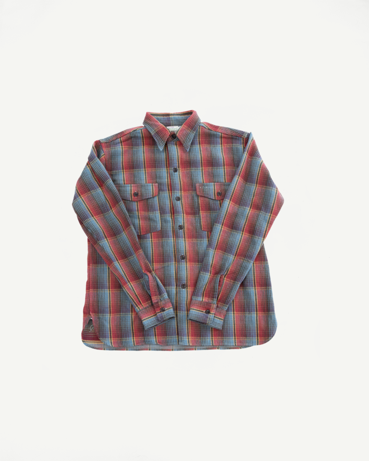Lot 3022 - Flannel Shirt w/ Chinstrap G Pattern, featuring red, blue, yellow plaid, two chest flap pockets, and a classic point collar, embodies vintage American workwear craftsmanship with Japanese textile expertise.