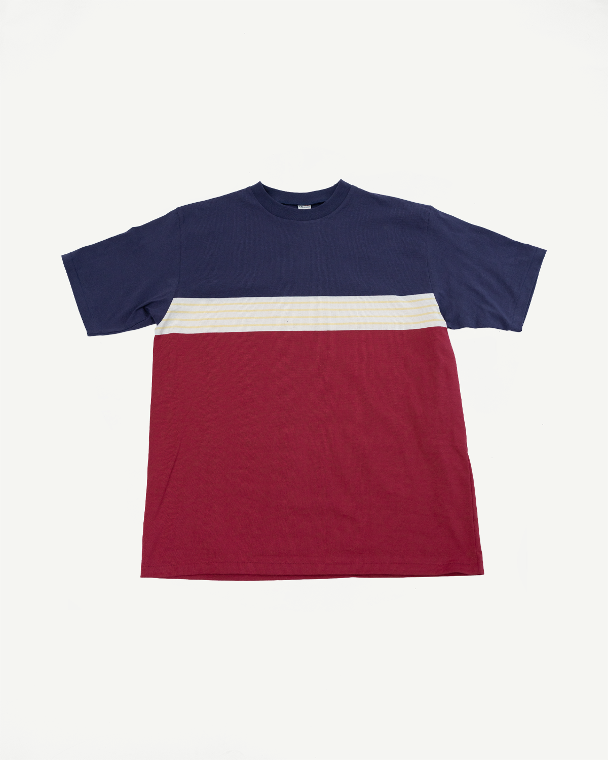 Flat lay front view of a tri-color navy, white, and burgundy short sleeve t-shirt.