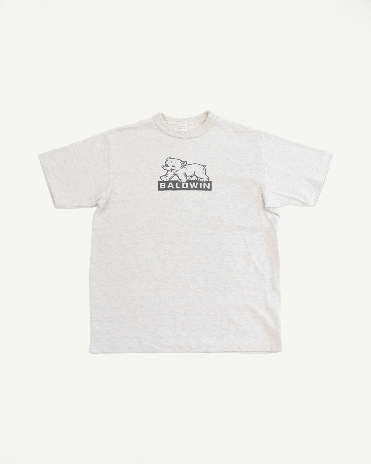 oatmeal t-shirt with a baldwin bear logo on a white background