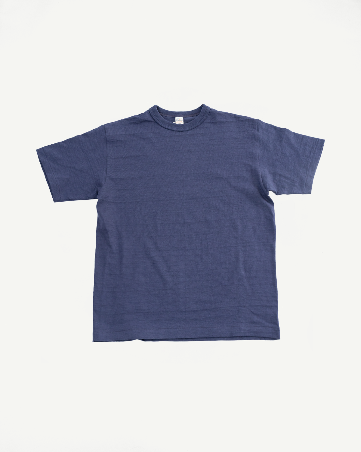 Flat lay of heather eggplant slubby cotton t-shirt, front view, showing short sleeves and crew neck.