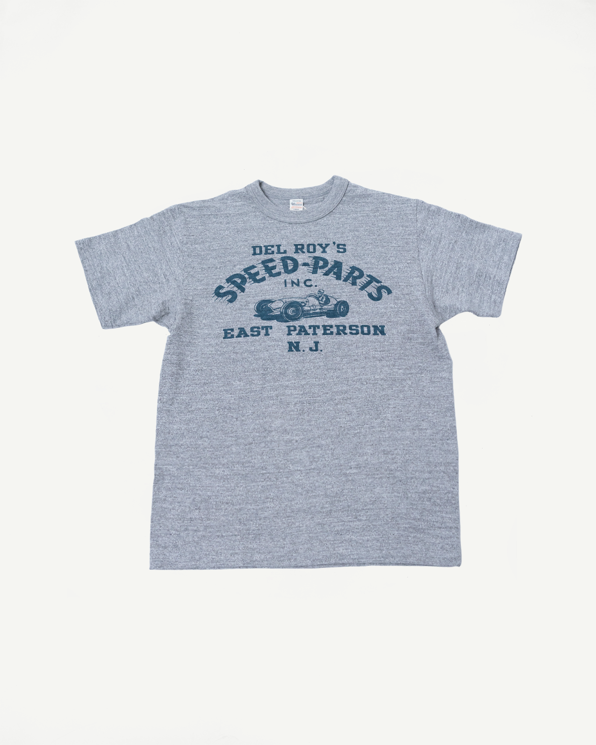 Front flat lay of Warehouse & Co Lot 4601 heather gray T-shirt with 'Del Roy's Speed Parts' graphic, crew neck, short sleeves, visible slubby cotton texture.