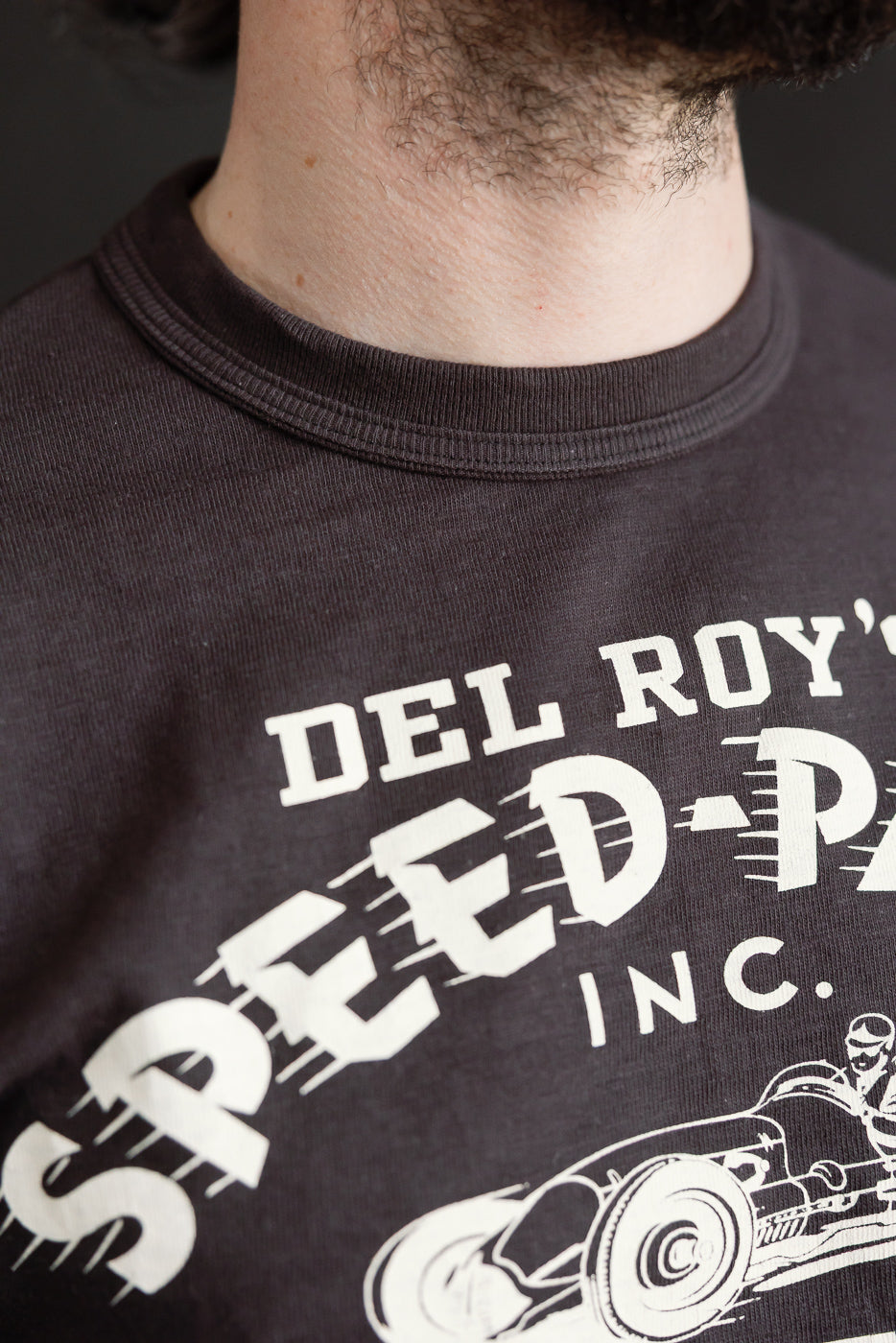 Close-up of front chest and collar on Warehouse & Co. Lot 4601 slubby cotton t-shirt, worn by male model 5'9