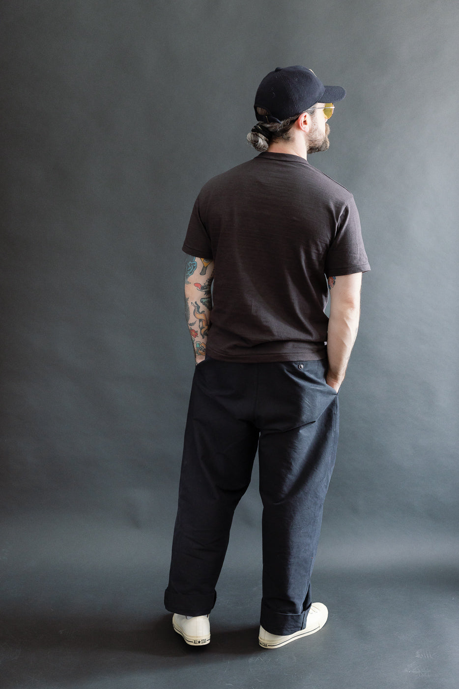 Full body rear view of male model 5'9