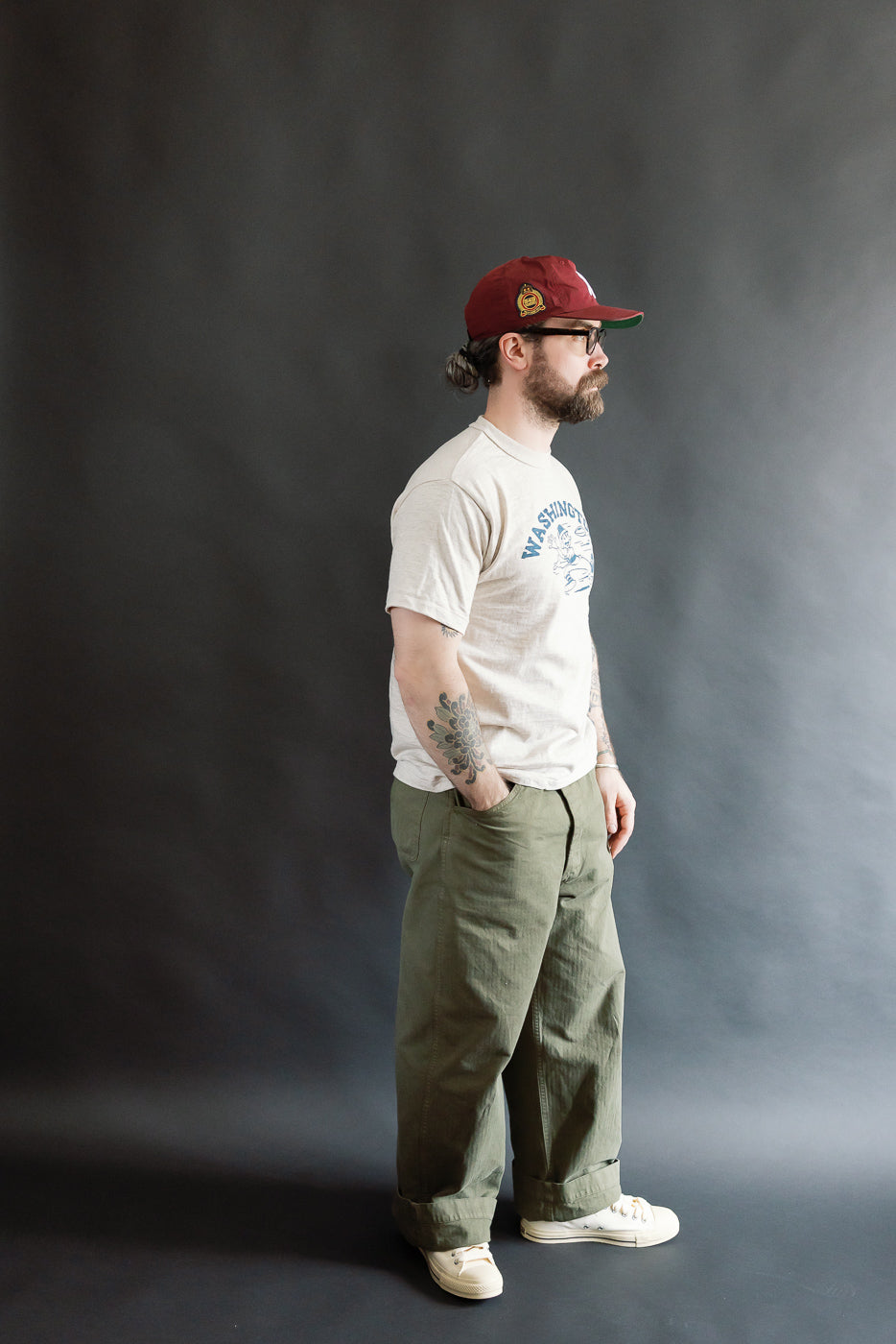 Full body side view of male model, 5'9