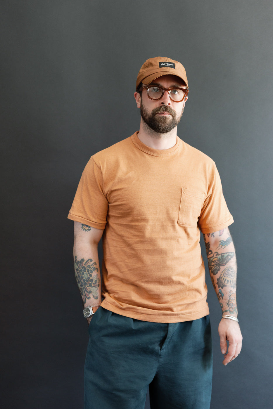 Full body front view of a male model, 5'9