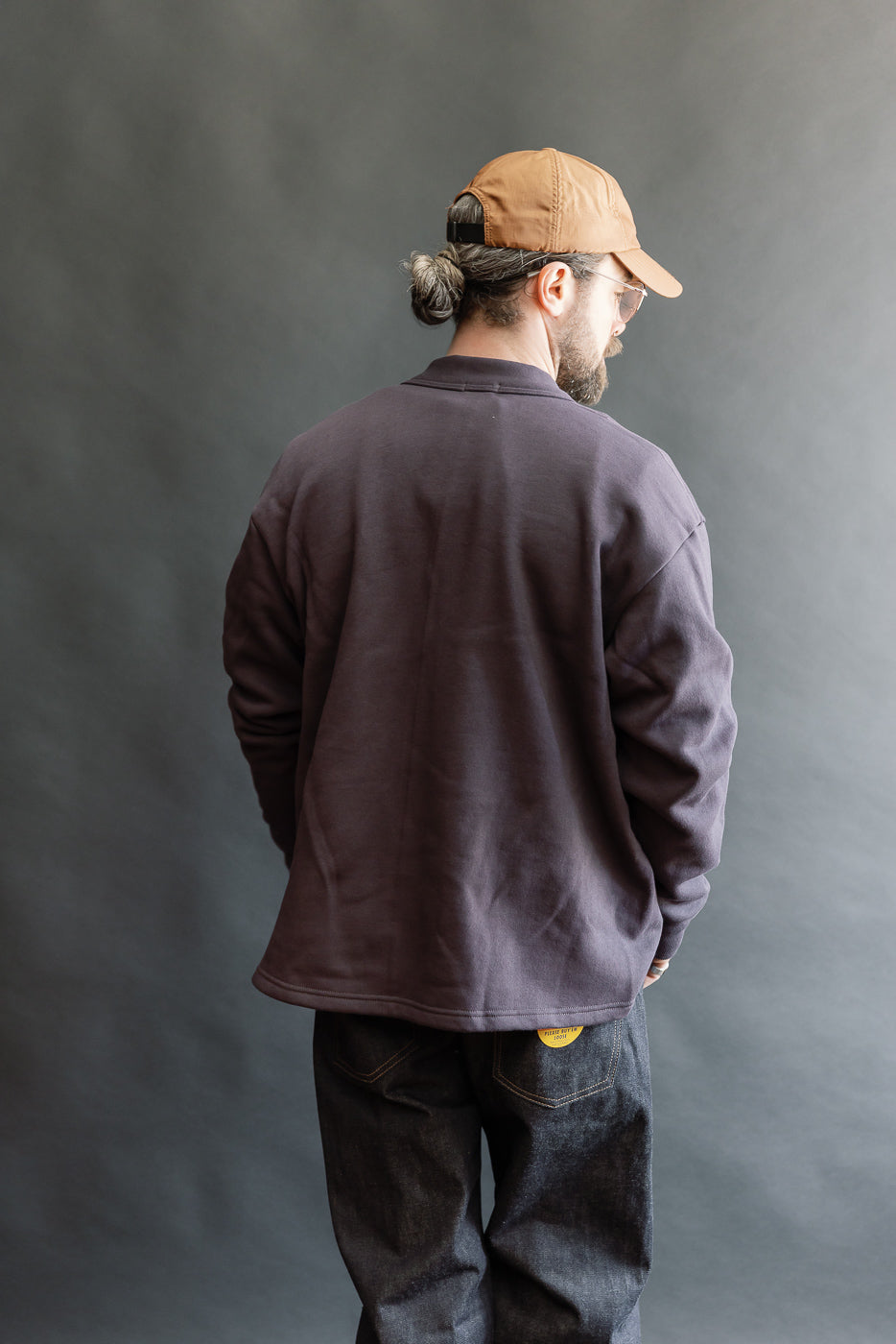 Full body rear view of a male model, 5'9